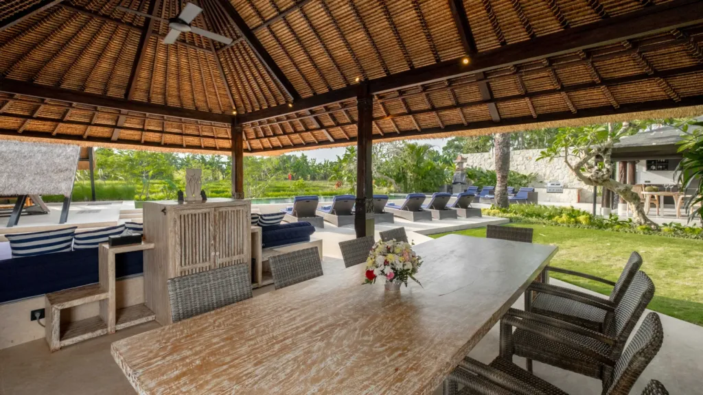 Poolside dining bale at Villa Kubu Dewi Sri, a 5-bedroom private-pool villa in Berawa, Canggu, Bali
