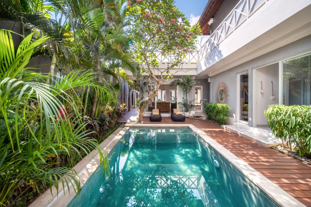 Villa Moana, Canggu — pool, swimming pool at Villa Moana surrounded by palms and a walled tropical garden