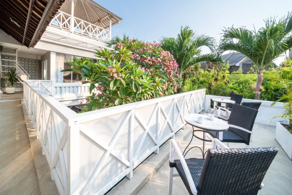 Villa Moana, Canggu — terrace, rooftop terrace at Villa Moana with seating and views over the Echo Beach treetops