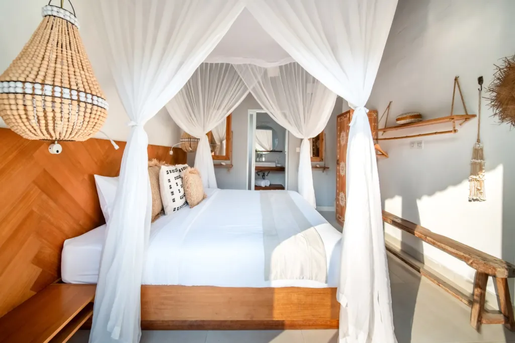 Villa Moana, Canggu — bedroom, villa Moana with king canopy bed and herringbone timber headboard
