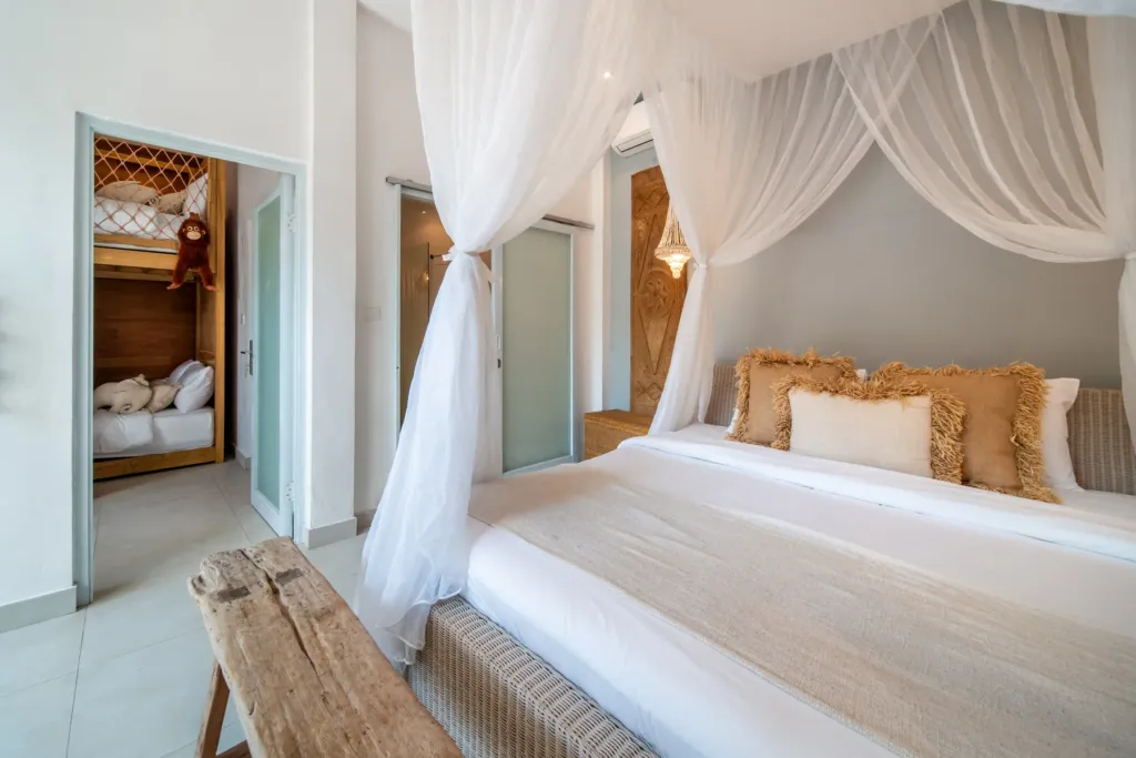 Villa Moana, Canggu — bedroom, king bedroom at Villa Moana with a connecting door through to the children's bunk room
