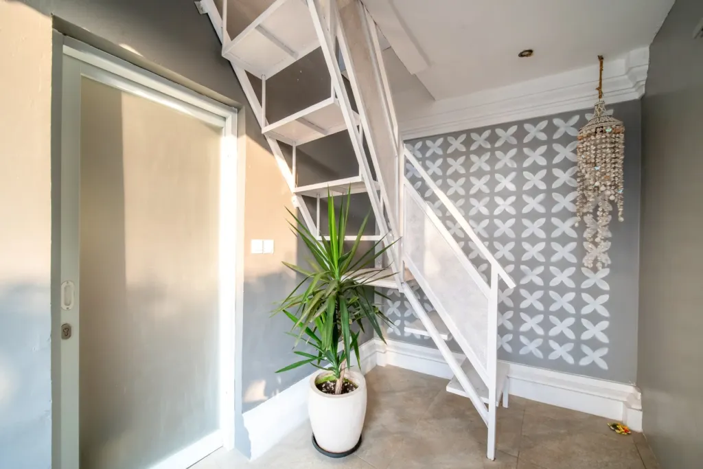 Staircase up to the rooftop yoga shala at Villa Moana