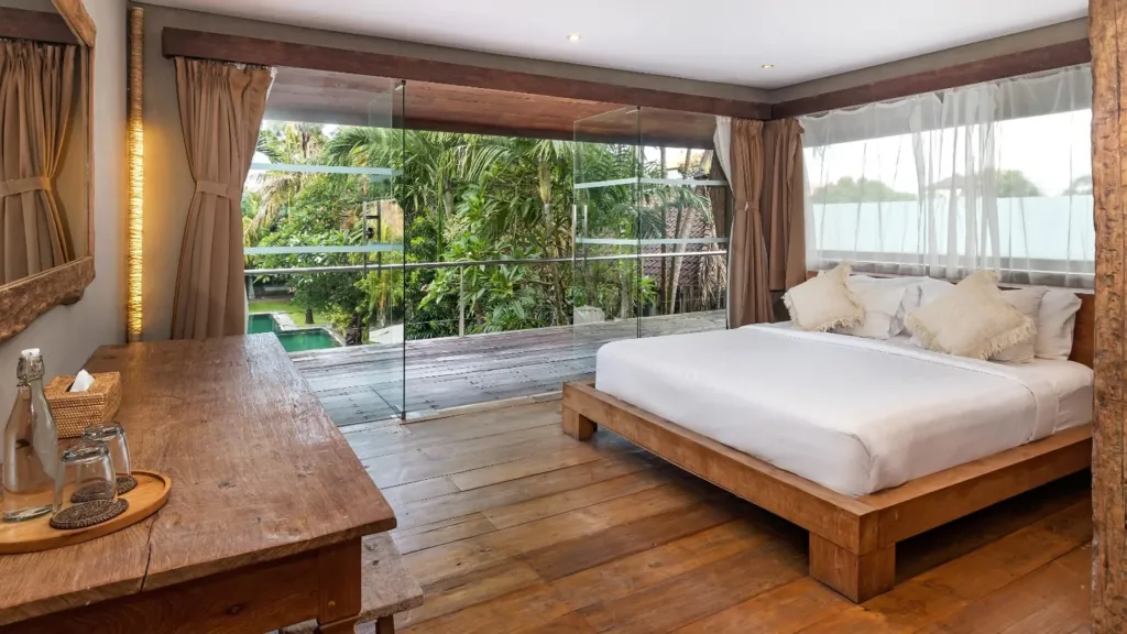 Bedroom 2 at Villa Yoga, a king room upstairs with bi-folding glass doors