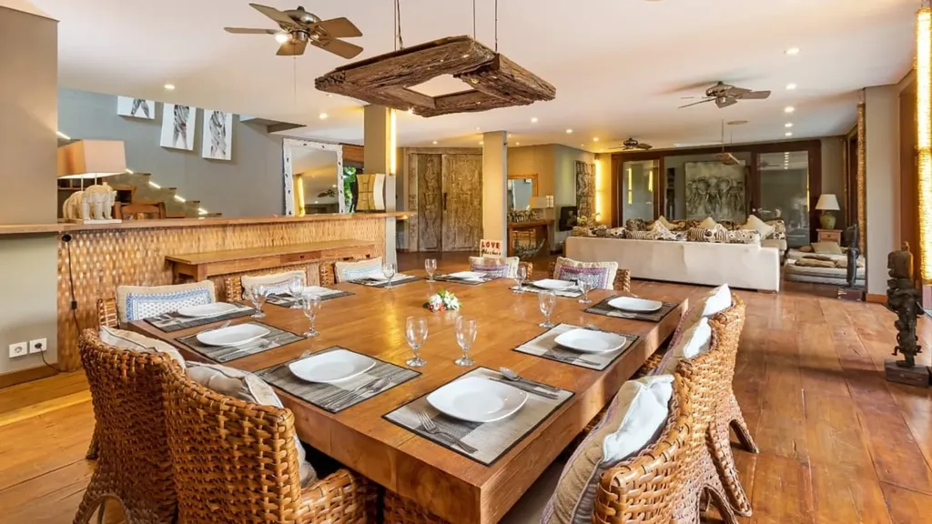 Dining area at Villa Yoga opening onto the pool terrace