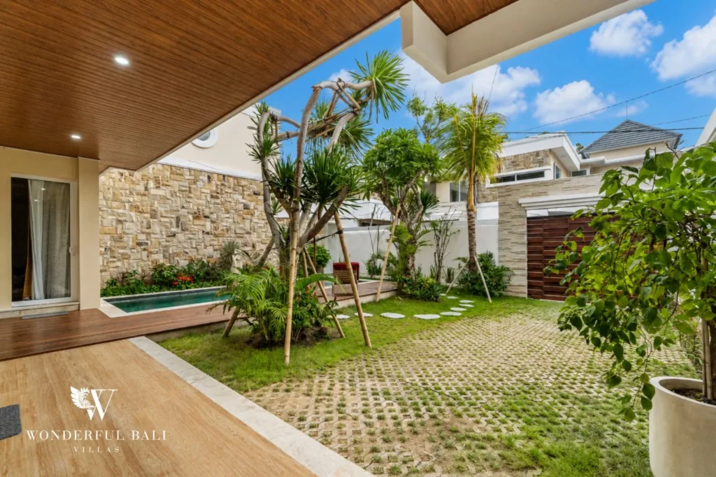 Garden with stepping stones leading to the pool at a 3-bedroom villa in Tumbak Bayuh Bali
