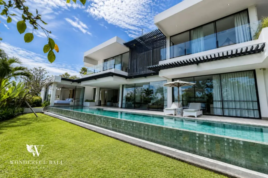 4BR villa for rent in Babakan, Canggu — garden, lawn pool and villa facade
