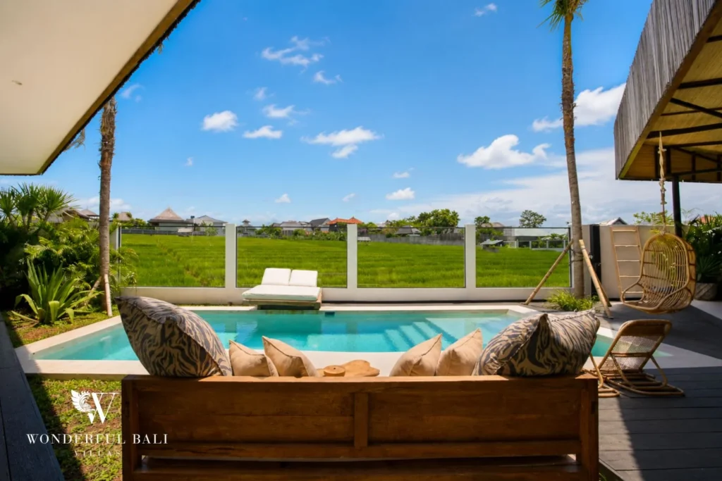 Private pool looking out over open rice fields at a 3-bedroom villa in Umalas Bali