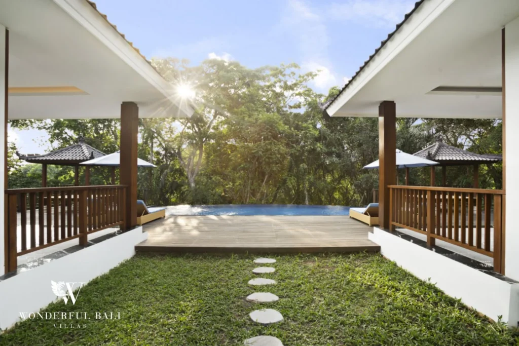Infinity pool framed between two pavilions at a 3-bedroom villa in Kaba-Kaba Bali