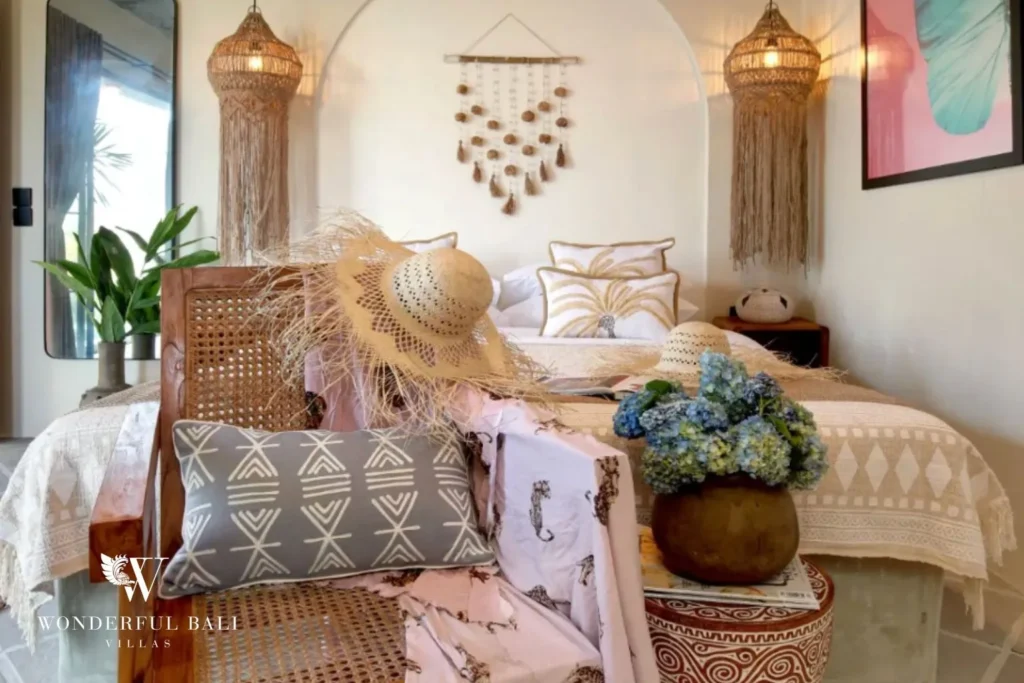 Bedroom with macrame pendants and arched alcove in a 2-bedroom villa in Buduk Canggu Bali