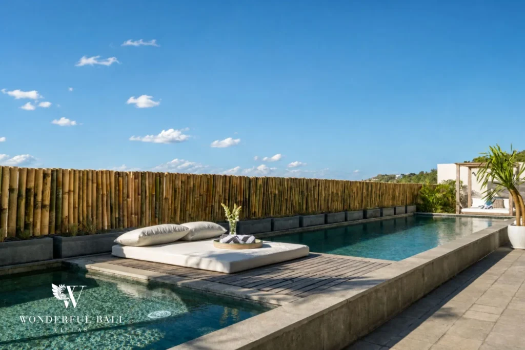 Floating daybed on a timber platform in the pool at a 5-bedroom villa in Uluwatu Bali