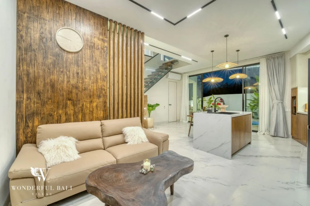 Living room with slatted timber screen and marble floor in a 3-bedroom villa near Nusa Dua Bali