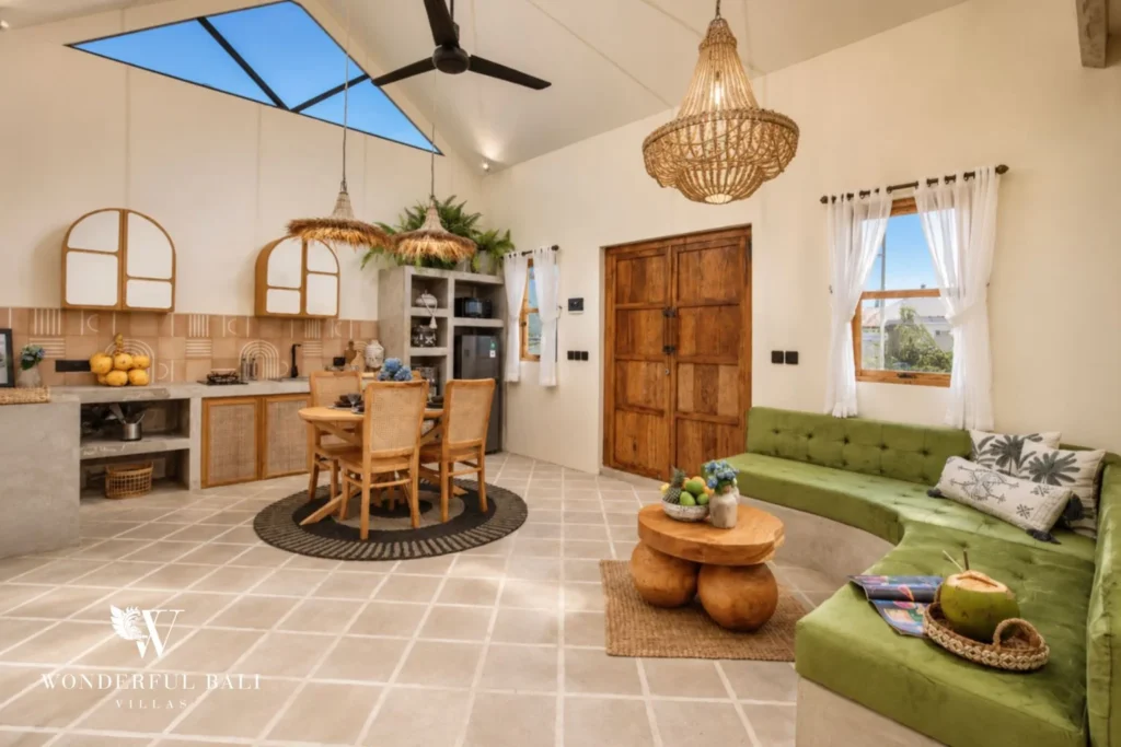 Open-plan living kitchen and dining under a vaulted ceiling in a 2-bedroom villa in Buduk Canggu Bali