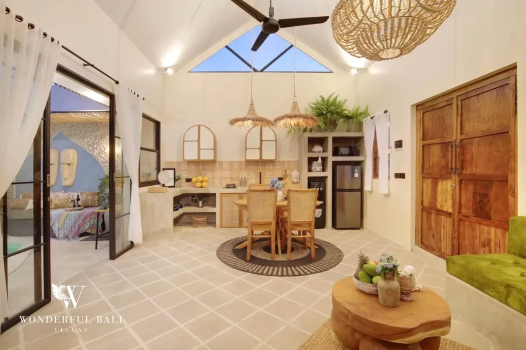 Living area looking through to the kitchen and pool courtyard in a 2-bedroom villa in Buduk Canggu Bali