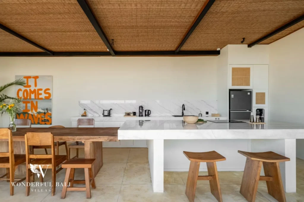 White marble kitchen island with induction hob in a 5-bedroom villa in Uluwatu Bali