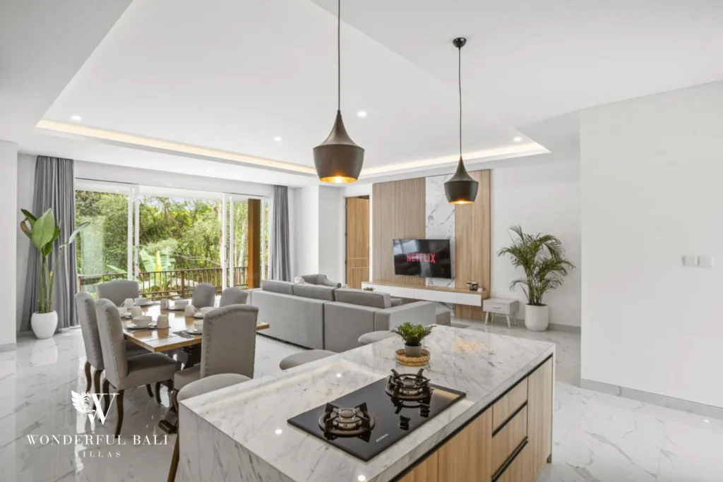Marble kitchen island and six-seat dining table in a 3-bedroom villa in Kaba-Kaba Bali
