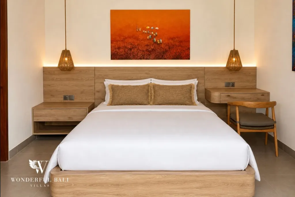 3BR villa for rent in Kedungu — bedroom, bed with a built-in headboard and pendant lights