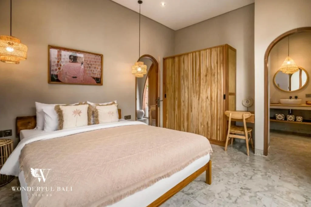 Bedroom with built-in teak wardrobe and dressing mirror in a 2-bedroom villa in Pererenan Bali