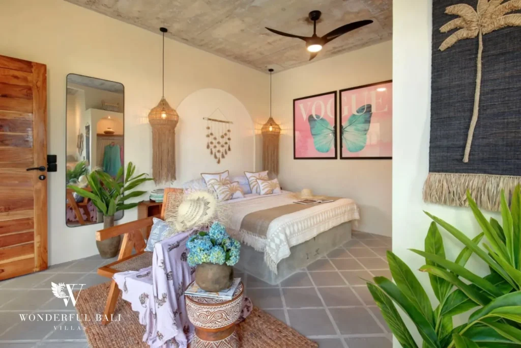 Main bedroom with macrame pendants and board-marked concrete ceiling in a 2-bedroom villa in Buduk Canggu Bali