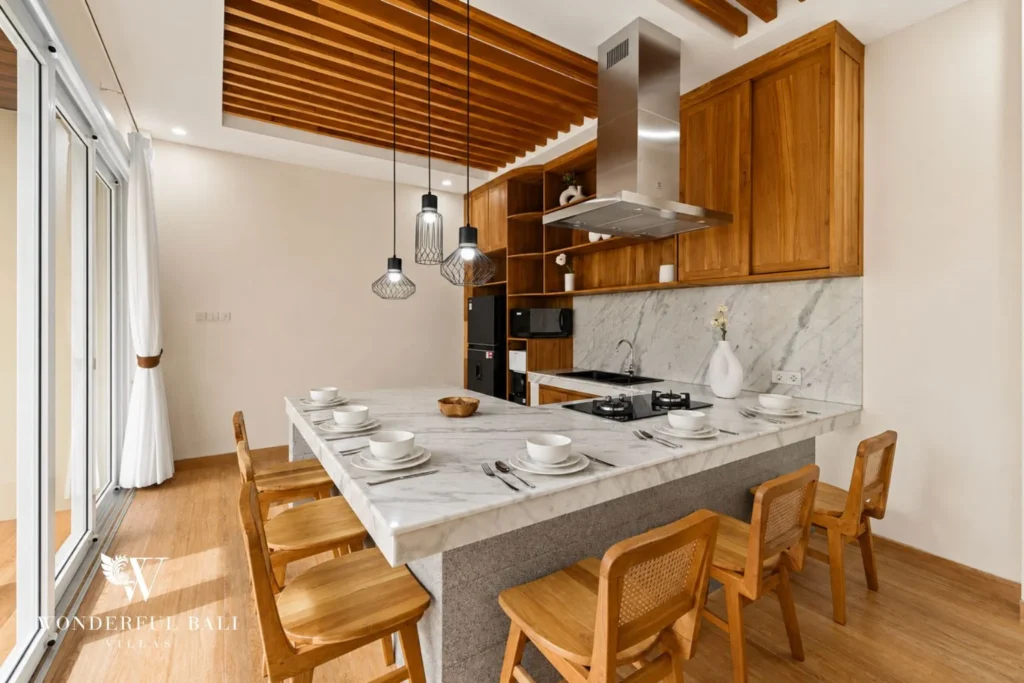 Marble breakfast peninsula seating six in a 3-bedroom villa in Tumbak Bayuh Bali