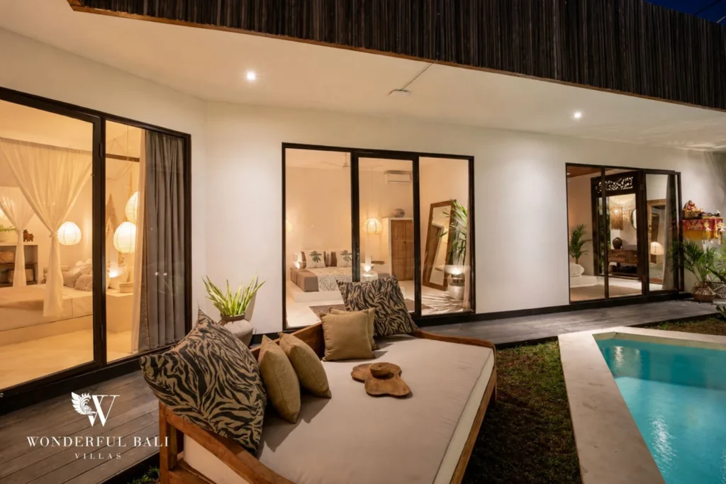 Daybed on the pool deck beside the bedrooms at a 3-bedroom villa in Umalas Bali