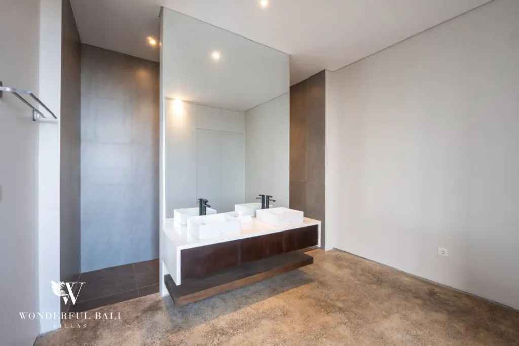 4BR villa for rent in Seminyak — bathroom, floating twin vanity with a walk-in shower