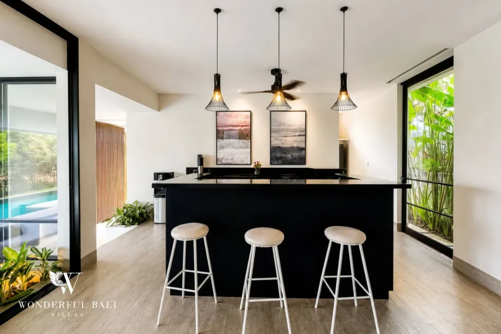 4BR villa for rent in Babakan, Canggu — kitchen, black island and bar seating