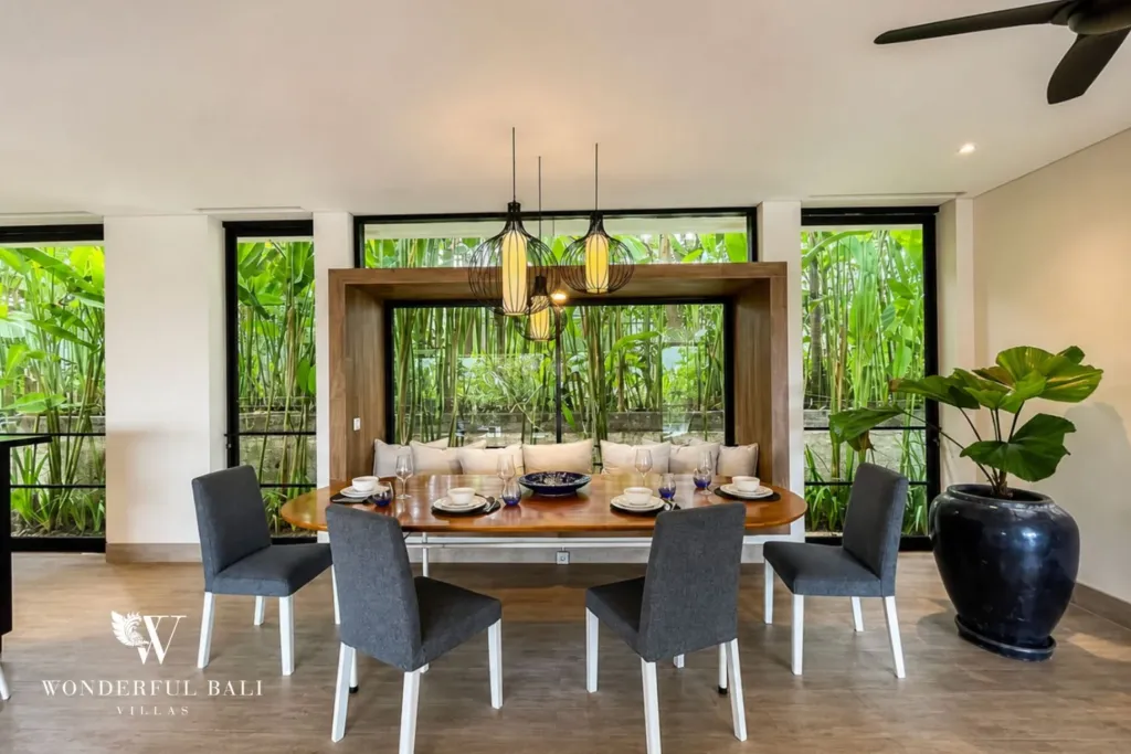 4BR villa for rent in Babakan, Canggu — dining, table with garden view