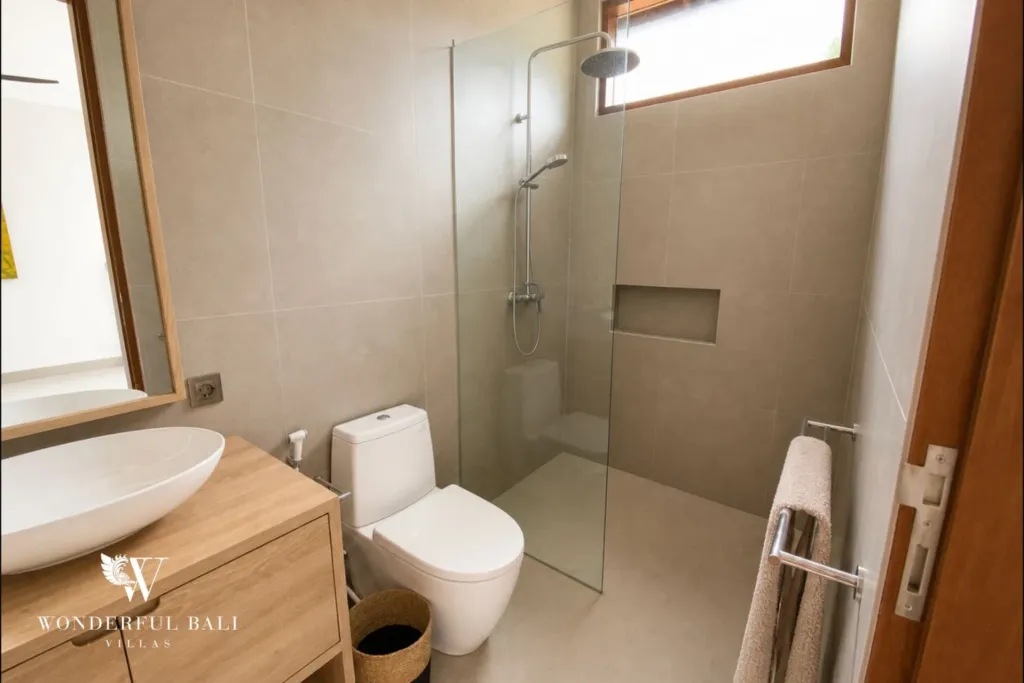 3BR villa for rent in Kedungu — bathroom, walk-in rain shower