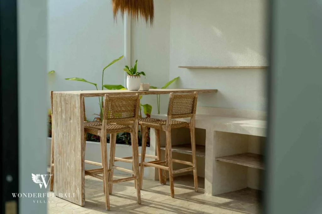 Rattan bar stools at a rooftop counter with planting at a 3-bedroom villa near Nusa Dua Bali