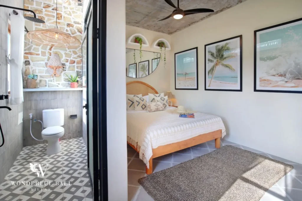 Second bathroom with natural stone wall and patterned floor tiles in a 2-bedroom villa in Buduk Canggu Bali