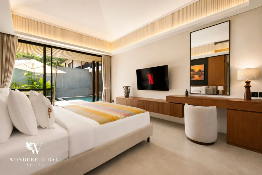Bedroom with dressing desk and smart TV in a 3-bedroom villa in Jimbaran Bali