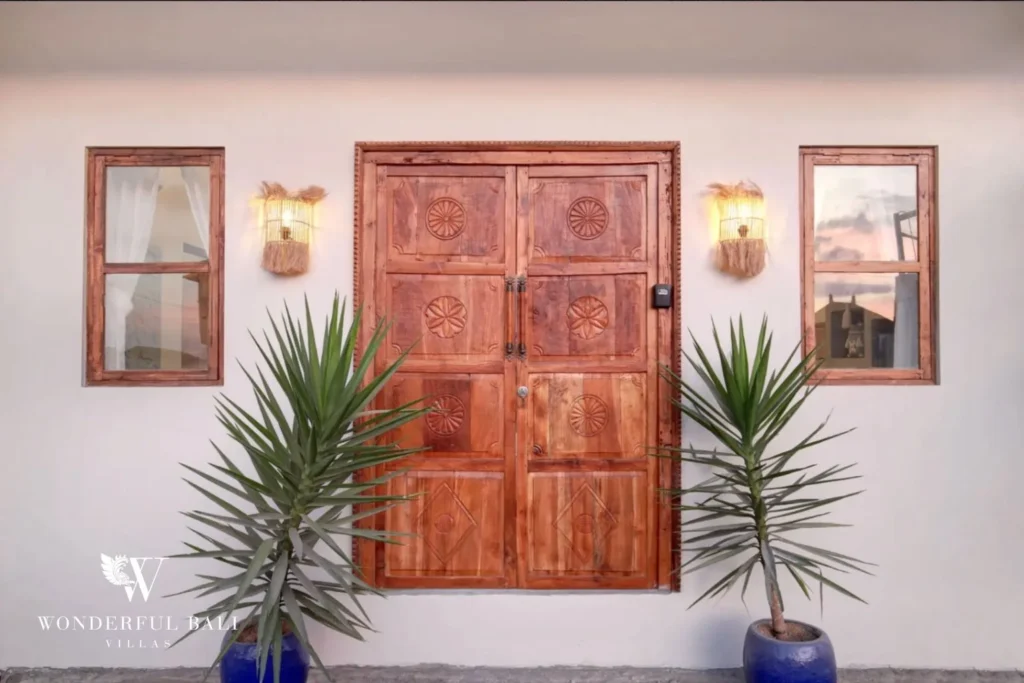 Carved timber entrance doors at a 2-bedroom villa in Buduk Canggu Bali