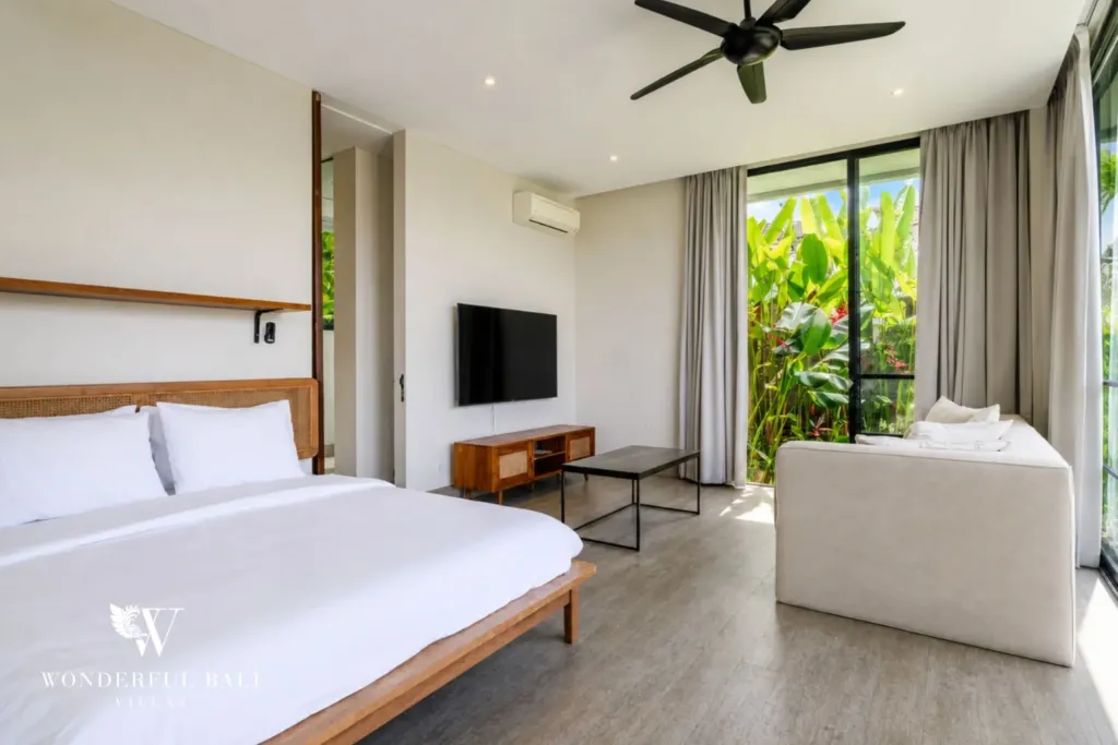 4BR villa for rent in Babakan, Canggu — bedroom, tv and garden view