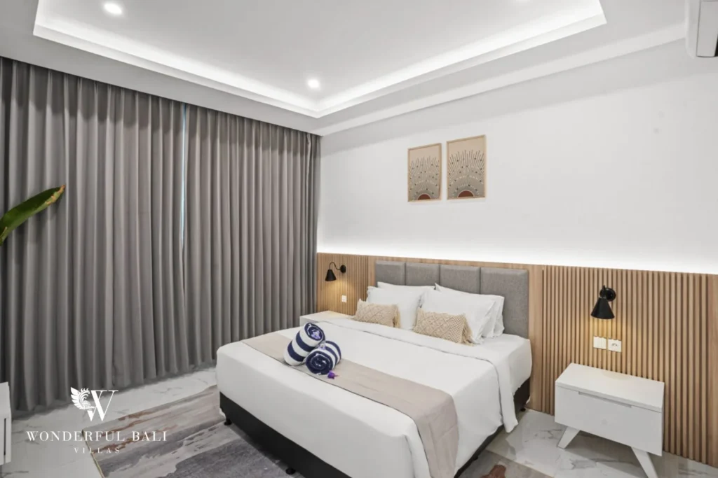 Third bedroom with fluted headboard and blackout curtains in a 3-bedroom villa in Kaba-Kaba Bali