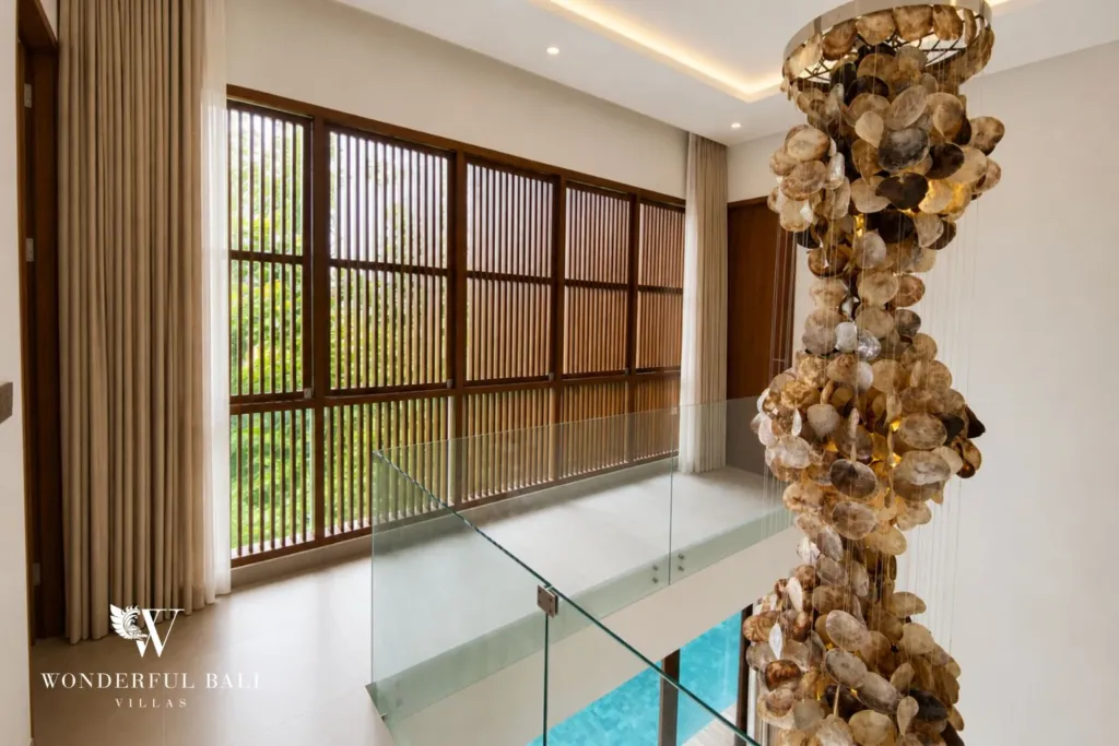 3BR villa for rent in Kedungu — landing, upstairs landing with a glass balustrade over the pool