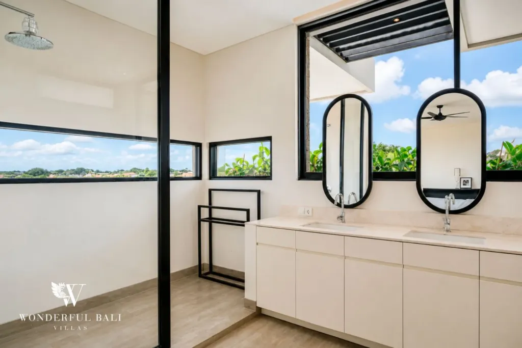 4BR villa for rent in Babakan, Canggu — bathroom, double vanity and rice paddy view