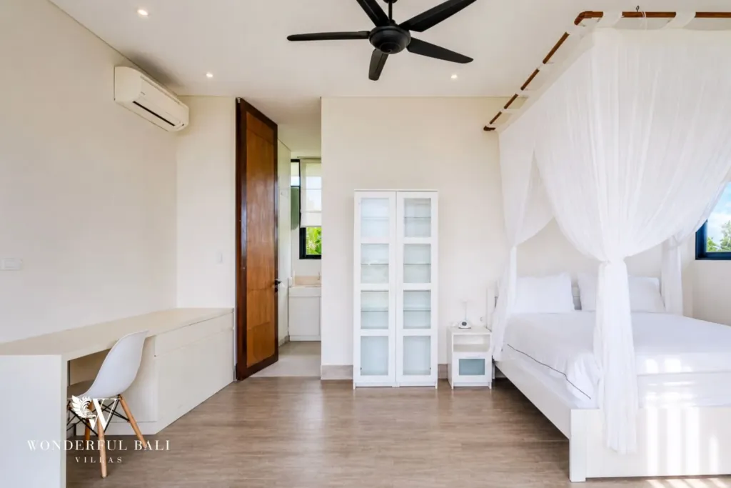 4BR villa for rent in Babakan, Canggu — bedroom, canopy bed and desk