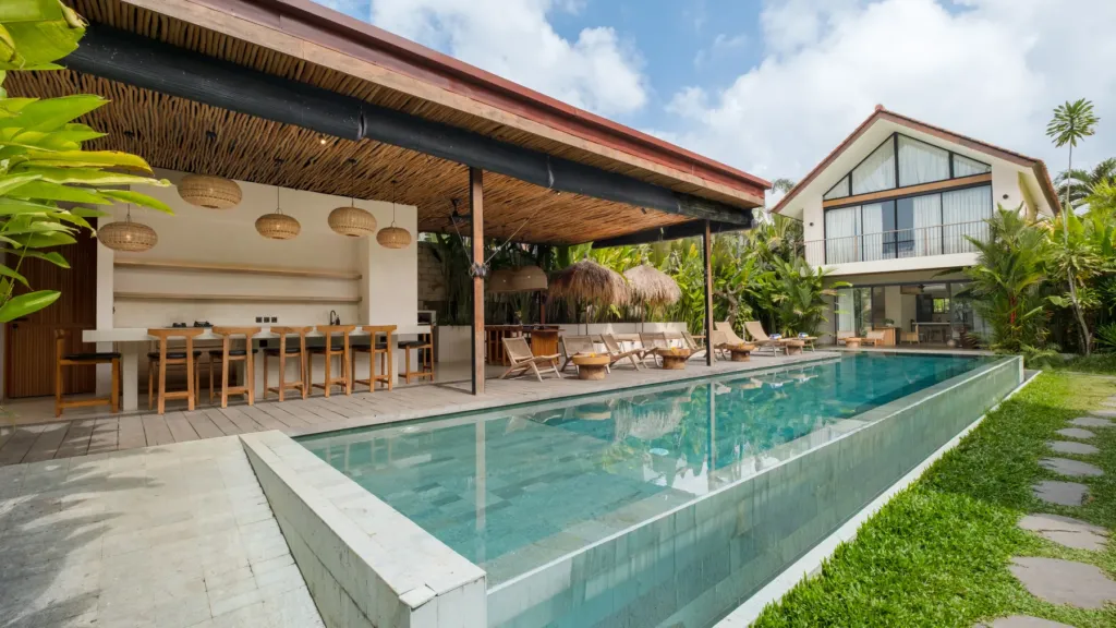 Lexington Palace Villa, Uluwatu — pool, timber sun loungers along the pool at Lexington Palace Villa