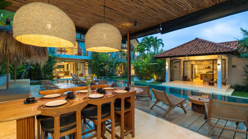 Lexington Palace Villa, Uluwatu — exterior, the bar pavilion and pool lit at dusk at Lexington Palace Villa