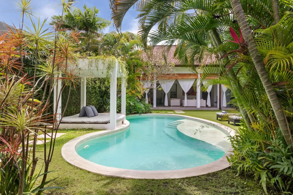 Villa Alice Dua, Seminyak — pool, a white pavilion at the water's edge at Villa Alice Dua