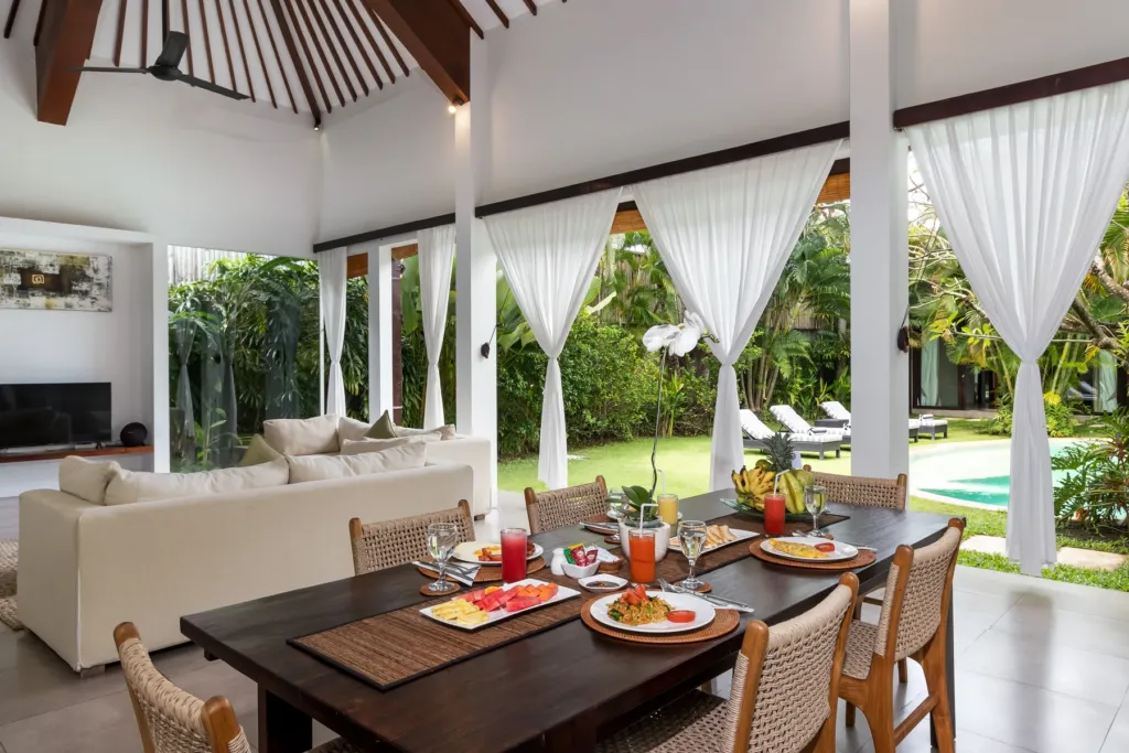 Villa Alice Dua, Seminyak — dining, white drapes onto the garden at Villa Alice Dua