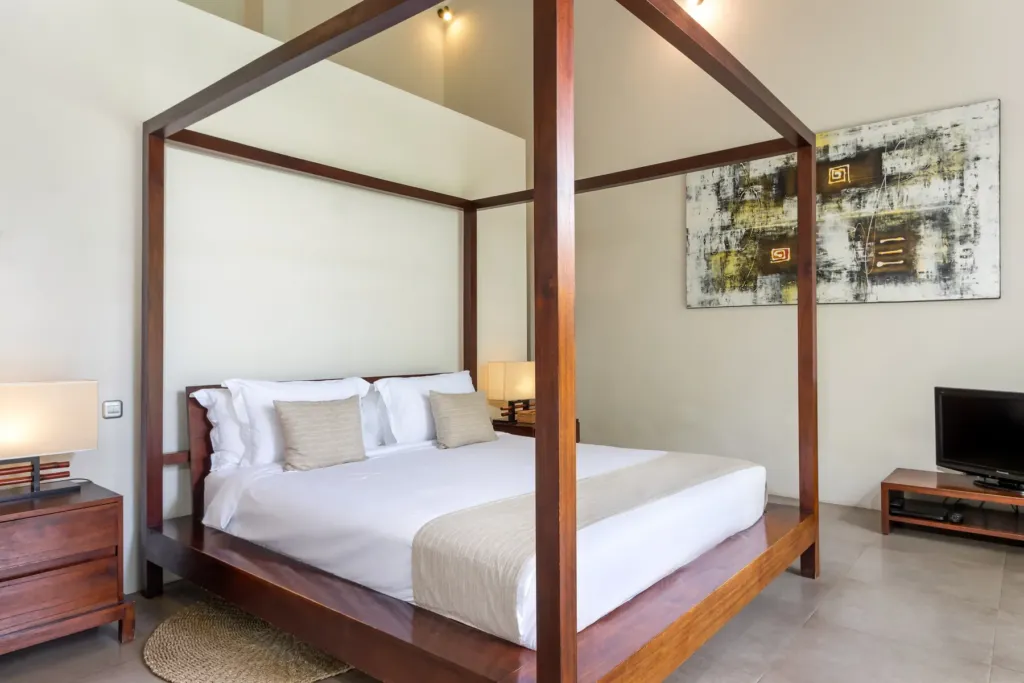 Villa Alice Dua, Seminyak — bedroom, canopied four-poster king bed in a bedroom at Villa Alice Dua