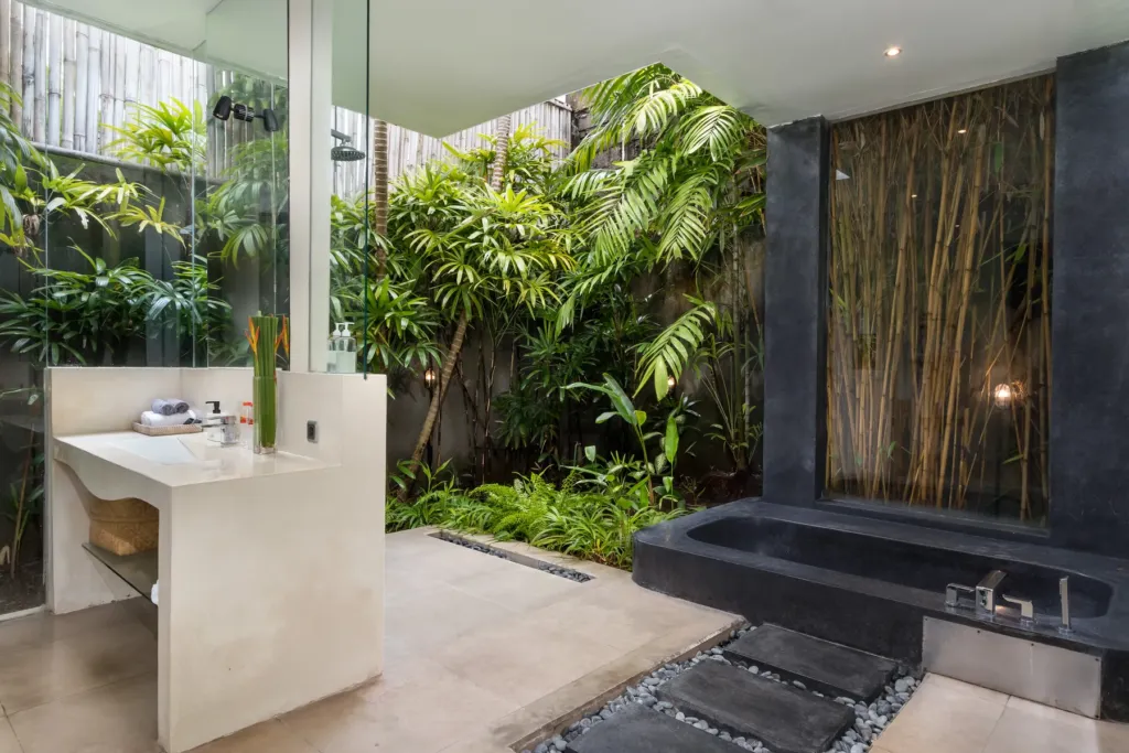 Villa Alice Dua, Seminyak — bathroom, stone vanity beside the planted en-suite courtyard at Villa Alice Dua
