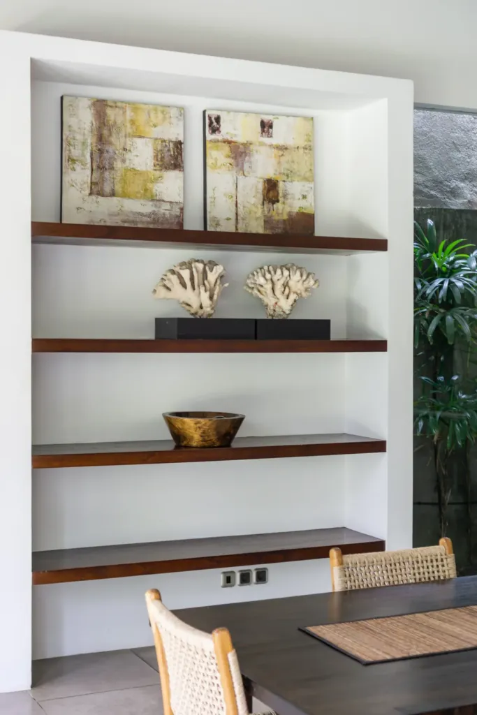 Open shelving and Balinese decor at Villa Alice Dua