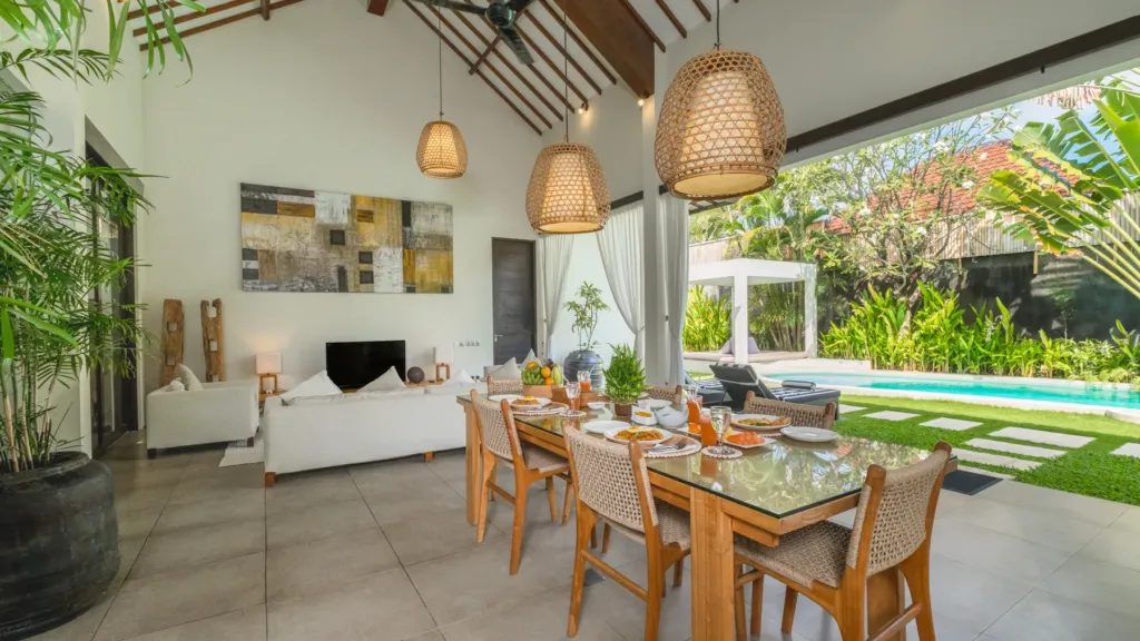 Dining pavilion and living area under a pitched roof at Villa Alice Satu