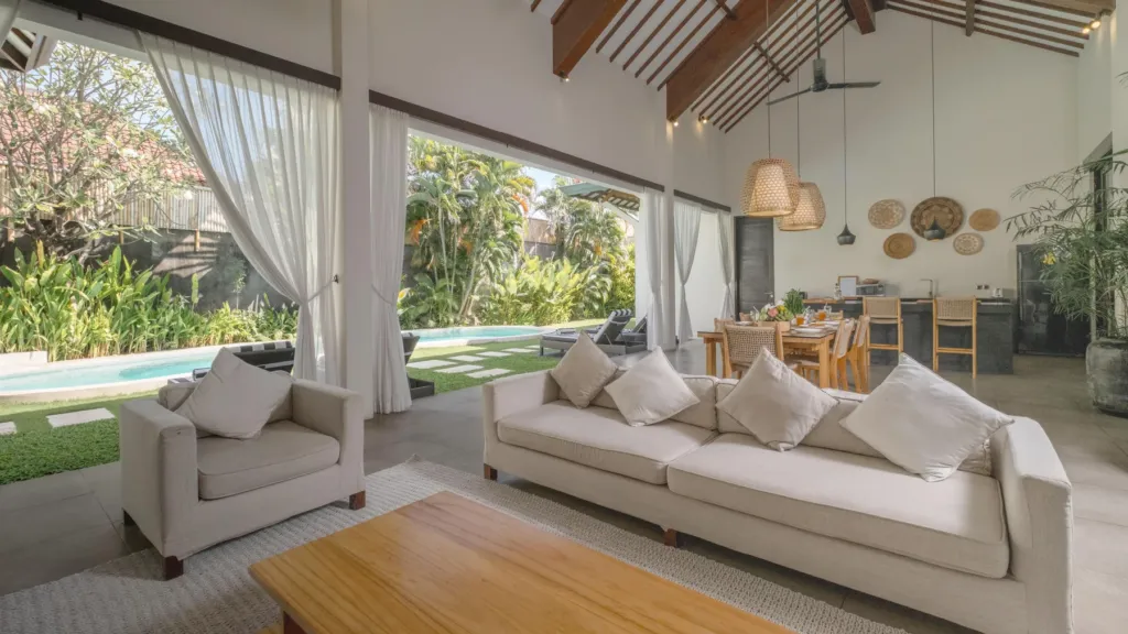 Deep sofas in the living area at Villa Alice Satu