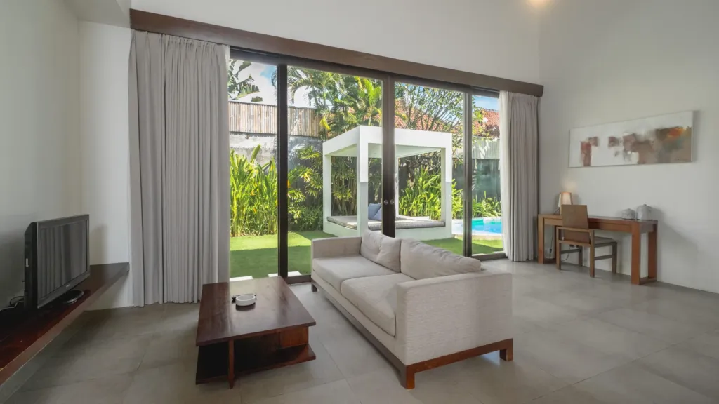Bedroom sitting area looking onto the garden at Villa Alice Satu