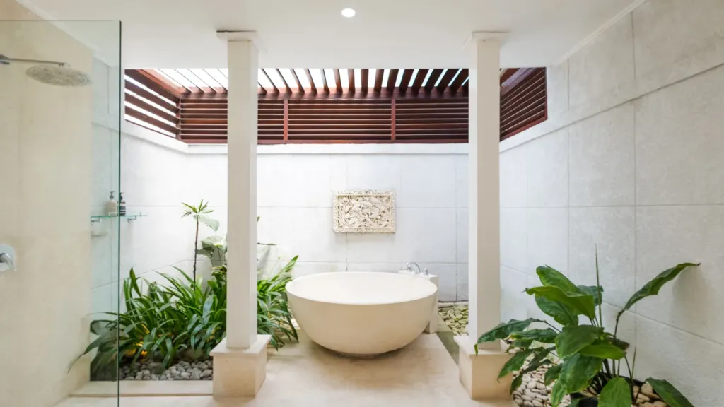 Villa Alun, Batu Belig — bathroom, freestanding stone bathtub in an open-air court
