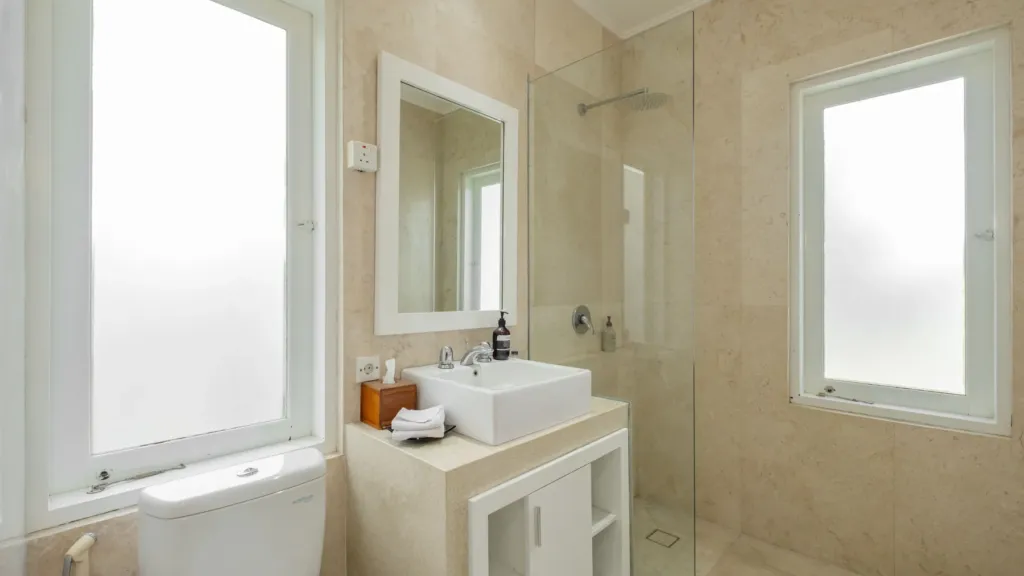 Villa Alun, Batu Belig — bathroom, stone vanity and walk-in rain shower