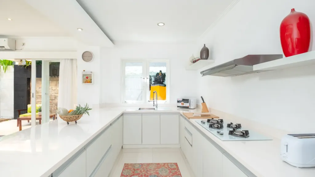 Villa Alun, Batu Belig — kitchen, gas hob, extractor and door to the garden